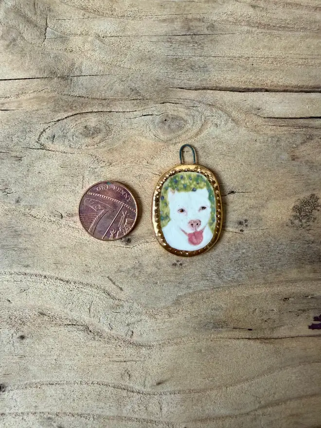custom pet portrait pendant miniatures. miniature pendant frames with pet names painted and stamped on the back.