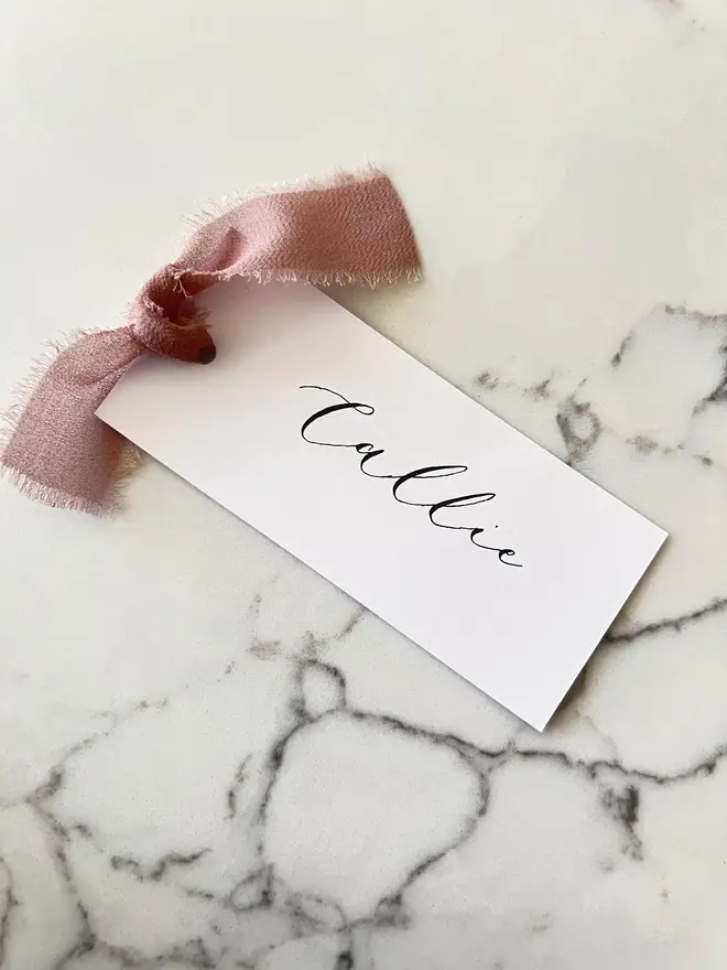 Personalised Calligraphy Wedding White Place Cards, white place cards with chiffon plum ribbon. 