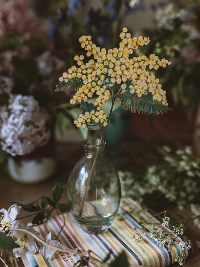 Wooden Mimosa Stem in a vase, set amongst some fresh flowers