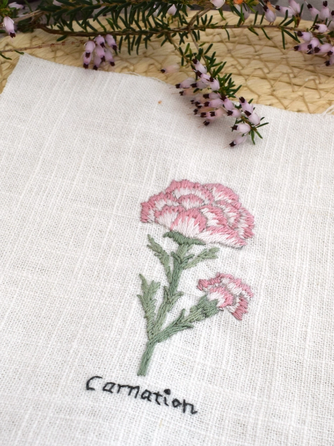 Floral Botanical embroidery kit of Carnation or Dianthus Caryophyllus a symbol for January and 1st wedding anniversary.  Meaning I’ll never forget you, Mothers Love, Fascination, Gratitude and Divine Love.
