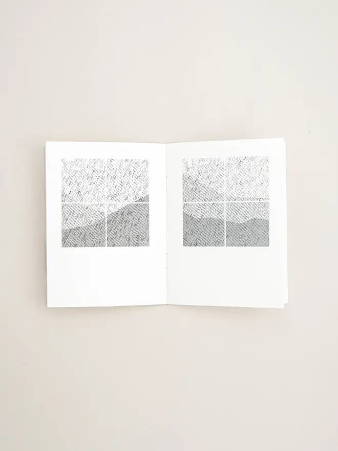 Bothy Book, open positioned on table. 