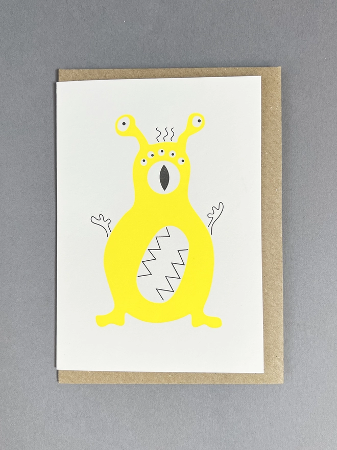 Neon yellow Alien number eight celebration note with eight eyes and eight teeth