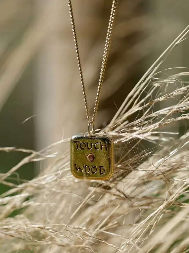 touch wood pipwin pendant necklace