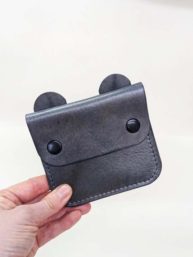 Front view of leather 'Tiny Wild Bear purse in Grey.
