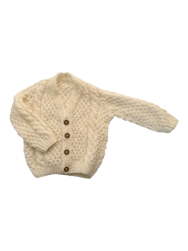 blank knitted cardigan on white backdrop