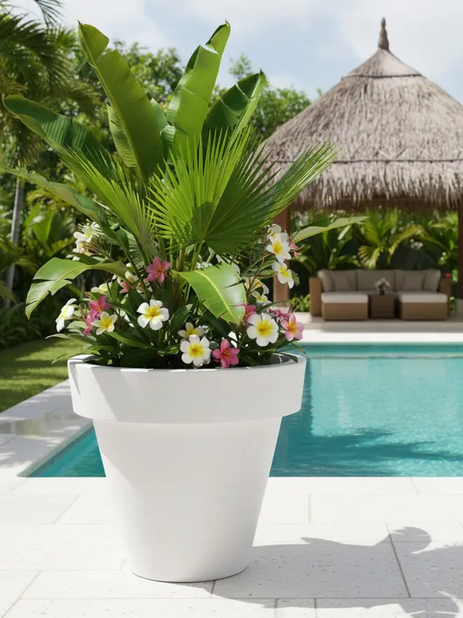 The white Tubby’s bright, sculptural presence instantly lifts outdoor and indoor spaces thanks to its generous proportions and clean curves. Its crisp colour enhances vibrant flowers and lush greenery, making it ideal for contemporary terraces and entranceways. Lightweight yet hard-wearing, it’s weather-resistant and designed for long-lasting use.