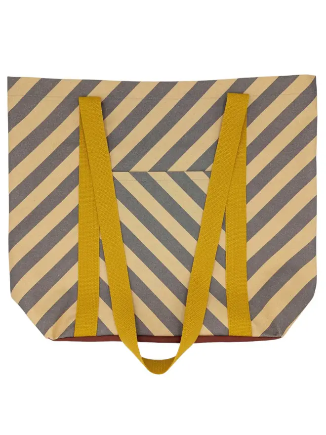 Tote Cotton Shopper Bag, a colourful patterned tote bag sitting on a plain white surface. 