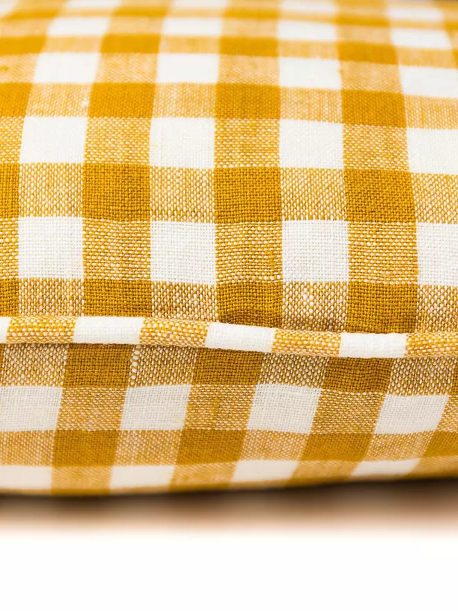 Gingham Lumbar cushion in 'Penzance' close up of cushion and piping