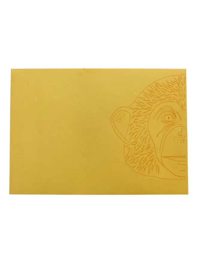 Full shot of image back of matching envelope with monkey motif to create a truly luxurious and special card.