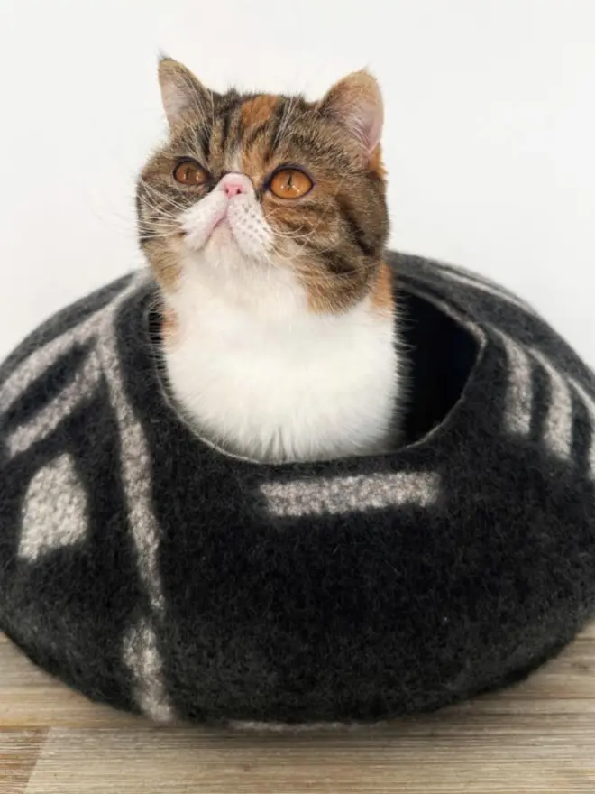 Black and white felt cat cave bed