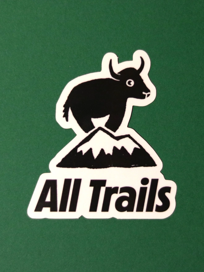 Sticker illustration of a yak on a mountain