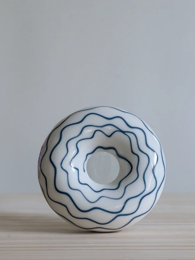 Avocado Planter White & Blue Handmade porcelain avocado planter with carved blue pattern, designed to hold an avocado seed for sprouting