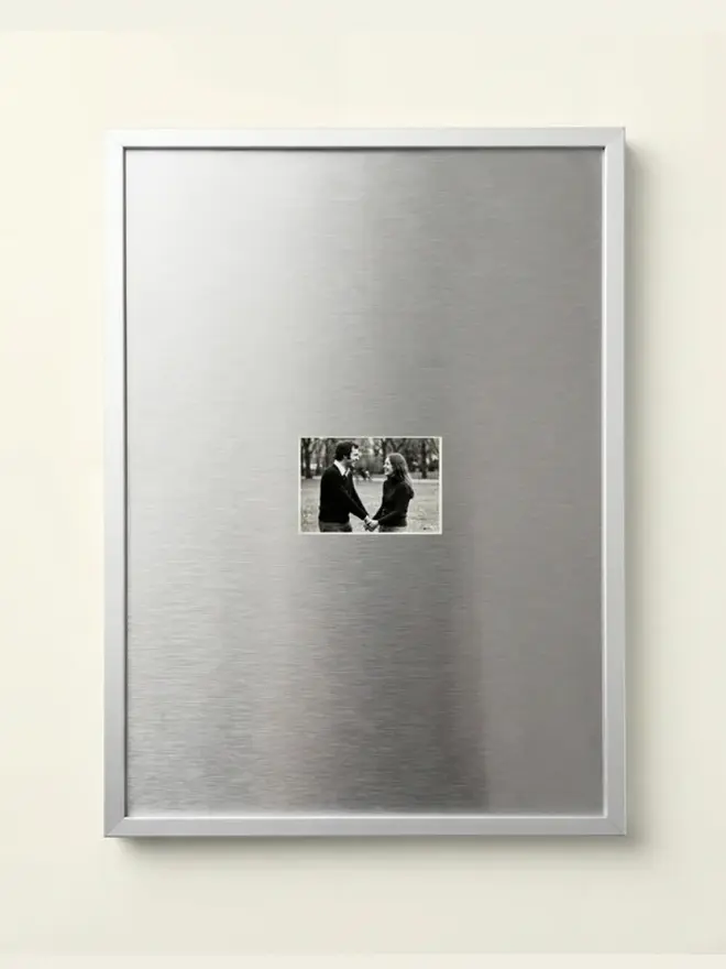 Magnetic Aluminium Picture Frame, hanging on a white wall. 