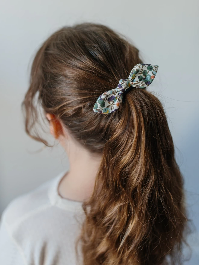 Little girl with pony tail and Liberty Hair bobble