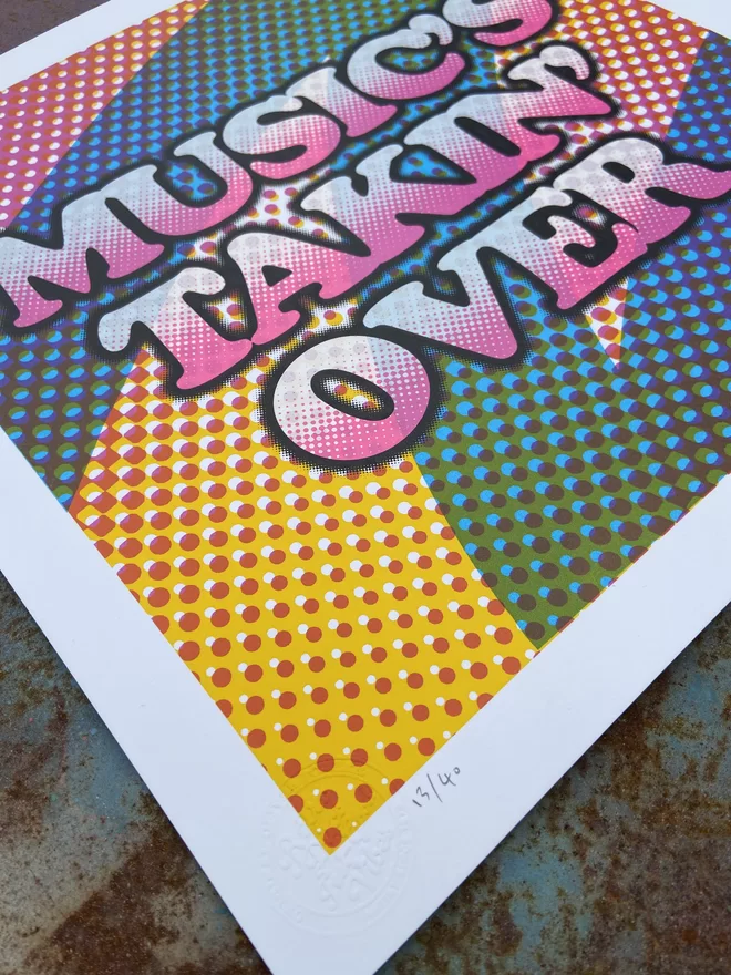 "Music's Takin' Over" Hand Pulled Screen Print square with multi coloured halftone back ground in shades of yellow k=magenta and cyan with the words music’s takin’ over printed on top with pink shading and a black glow outline 