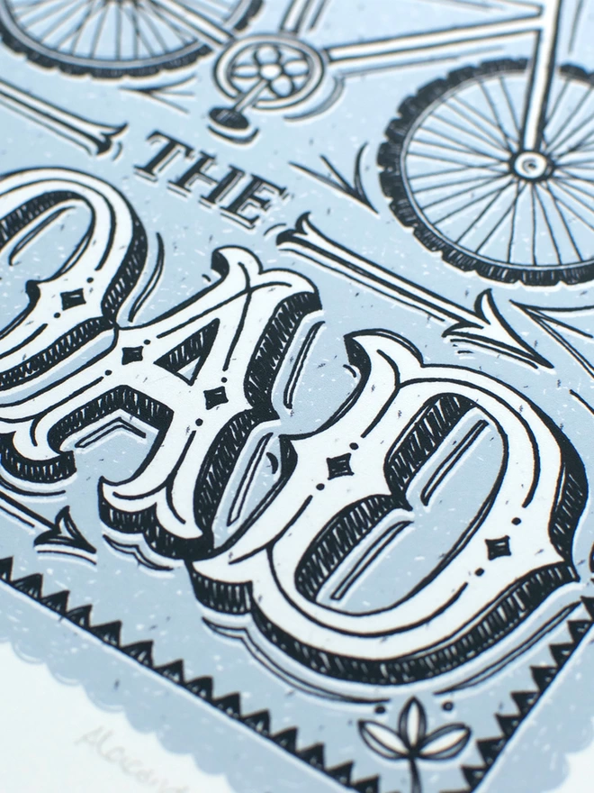 detail of A and D hand lettered in blue and white