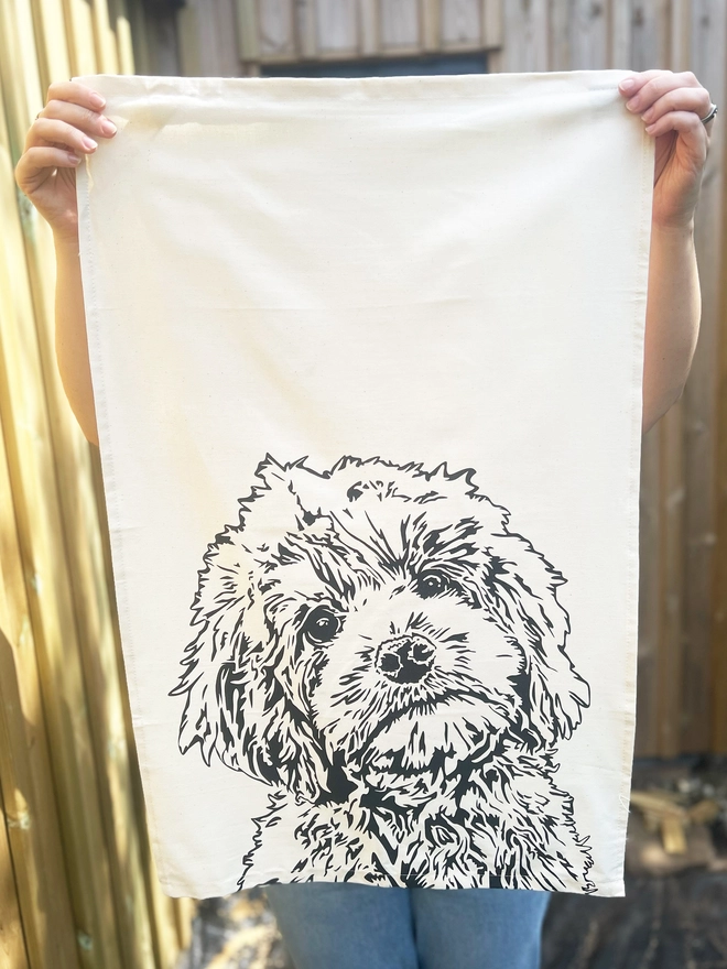 Full image of cockapoo dog tea towel with the cockapoos head printed in the bottom half