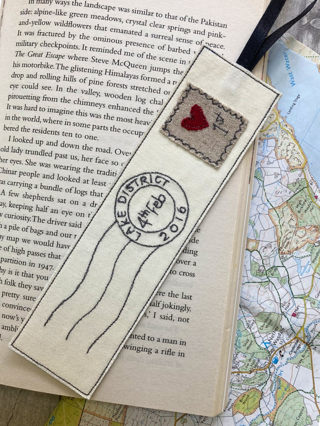Embroidered bookmark with personalised postmark