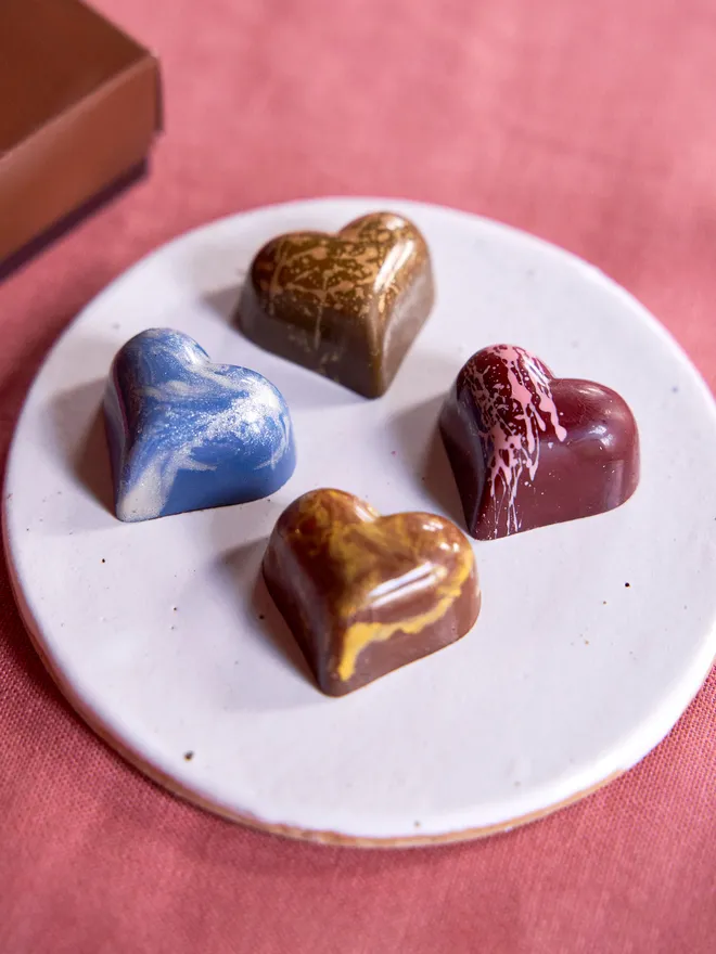 Set of four heart chocolates for Valentine's Day. 