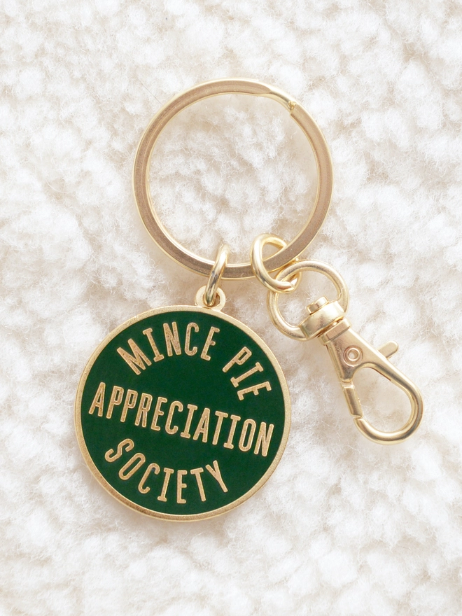 Green enamel keyring featuring 'Mince Pie Appreciation Society' design