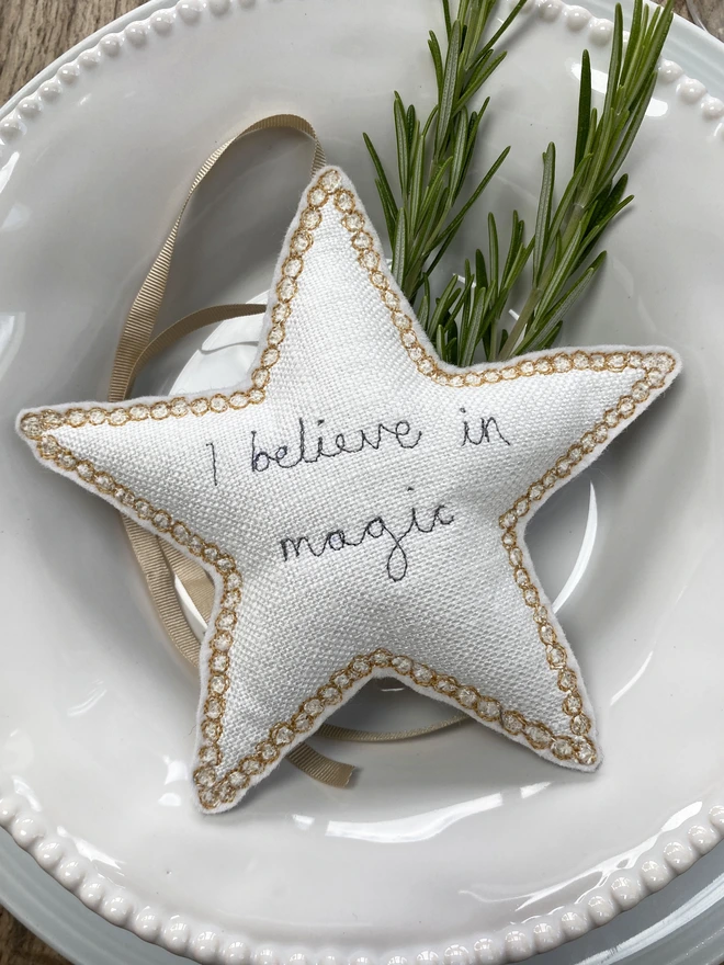 Fabric Embroidered Edge Star Decoration on a plate