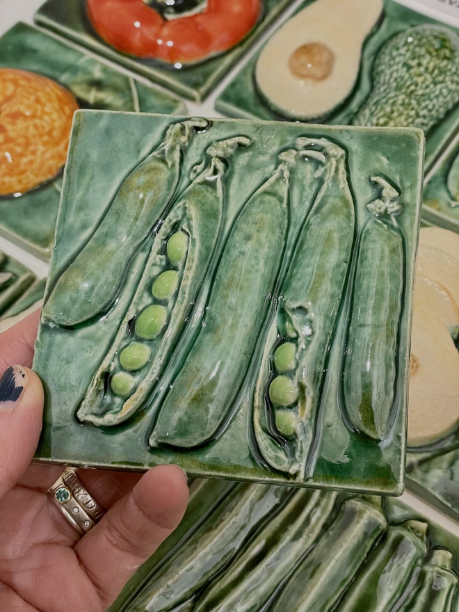 Green ceramic pea tile.