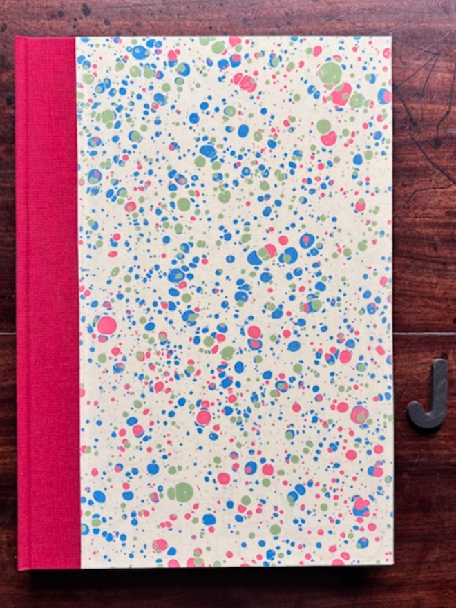 Portrait Sketchbook. A sketchbook in J