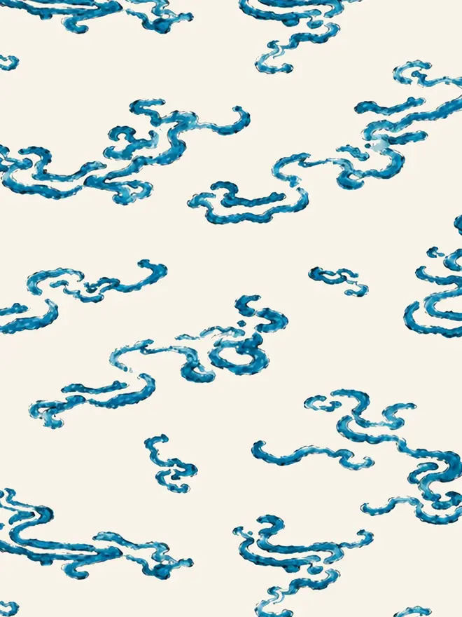 indigo waves illustrated wallpaper. a cream background wallpaper with blue waves.