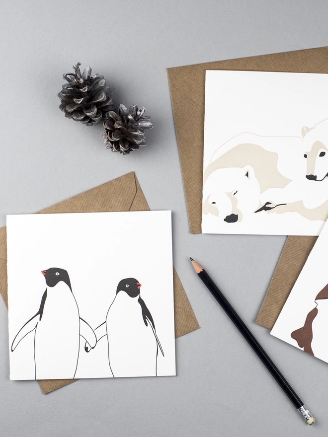 zoomed out image of polar bear and penguins in love big card with embossed finish