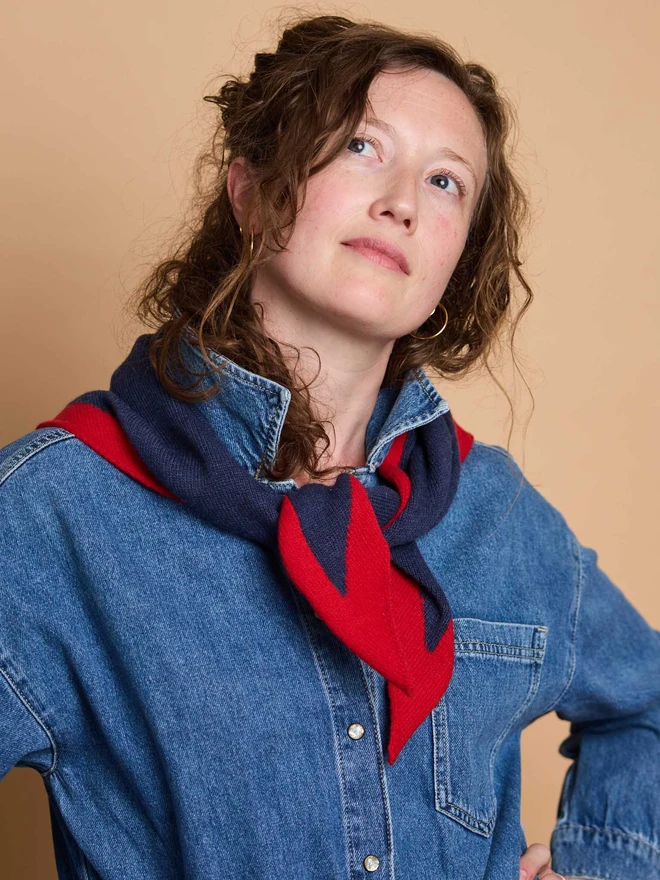 woman wearing navy and red wool neckerchief