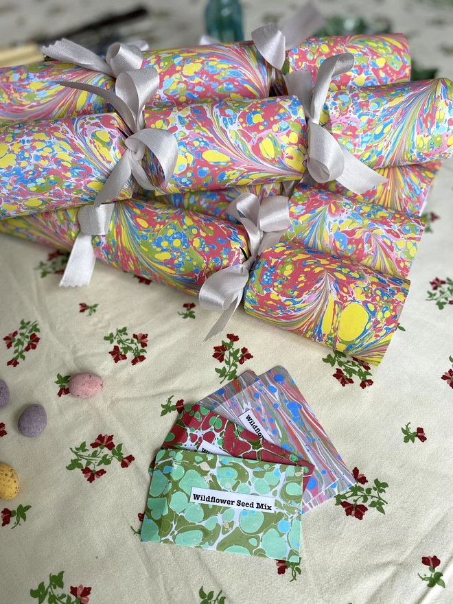 Hand-marbled Easter or Birthday crackers  showing seed packet gifts