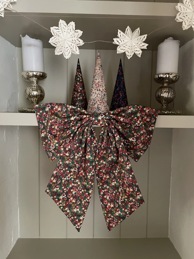 Oversized bow made with Liberty London Emma Etoile fabric, the perfect Christmas decoration