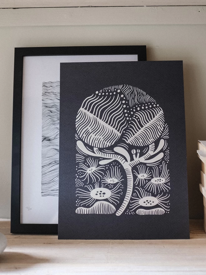 Black and white abstract flowers print illustrated in an arched shape a print for bold interiors