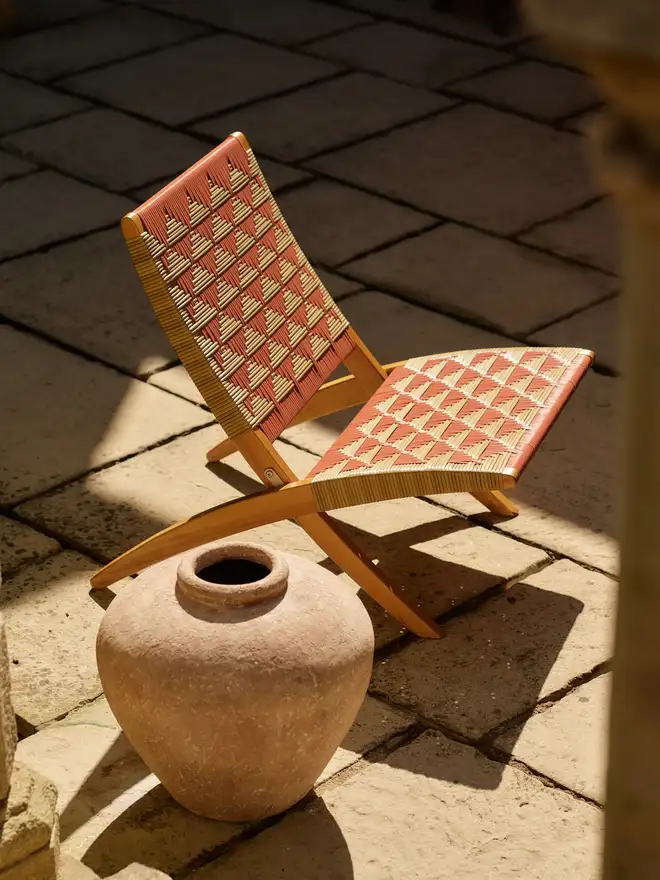 Burnt ochre lounge chair courtyard
