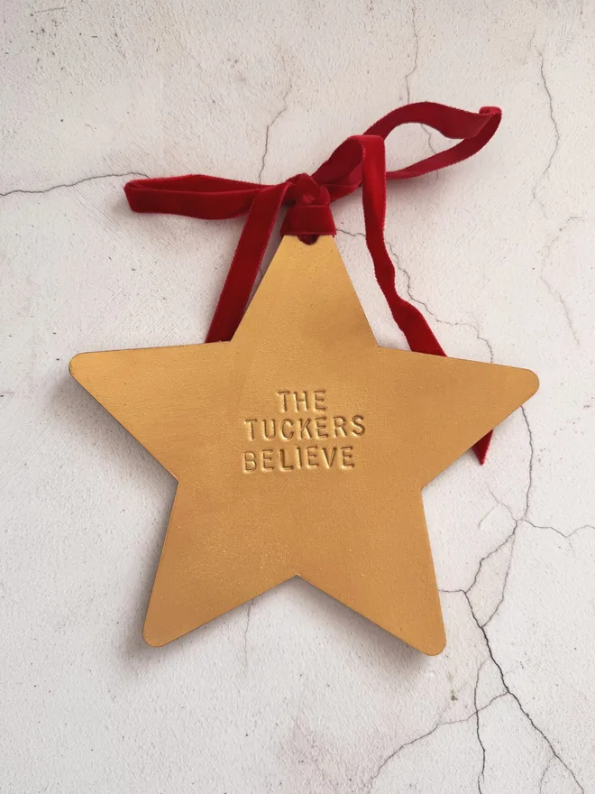 gold leather hand stamped tree topper