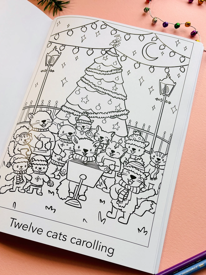 Inside page of children’s Christmas colouring book with hand-drawn animal characters.