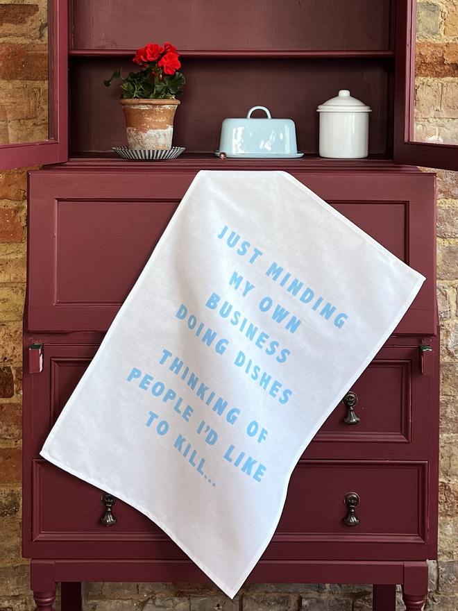 Catherine Colebrook ' 'Just minding my own business doing dishes thinking of people I'd like to kill' tea towel