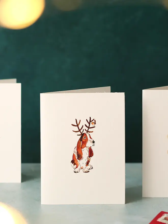 illustrated beagle with reindeer antlers christmas card