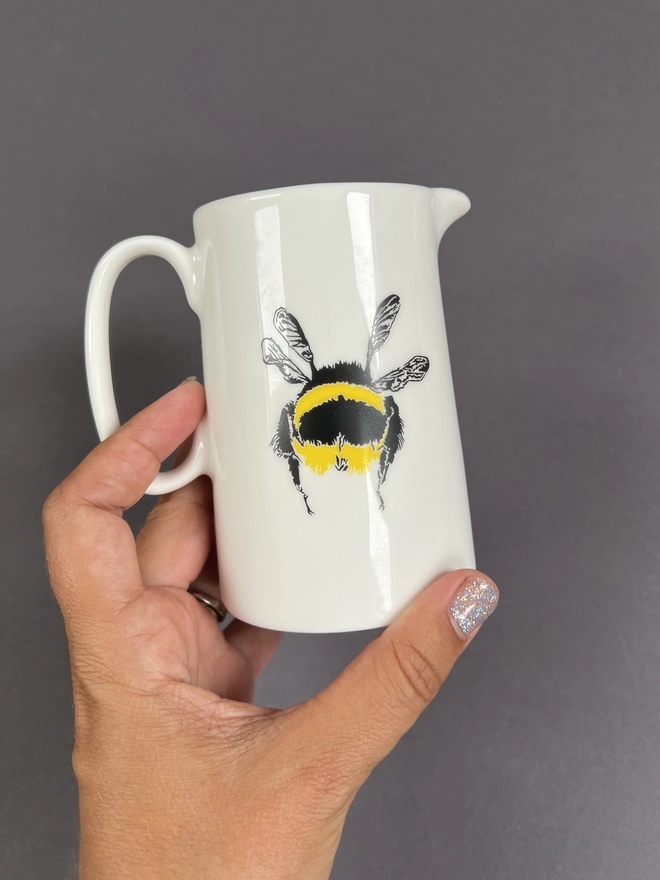 Back of the half pint jug showing the cute fluffy bee bottom  