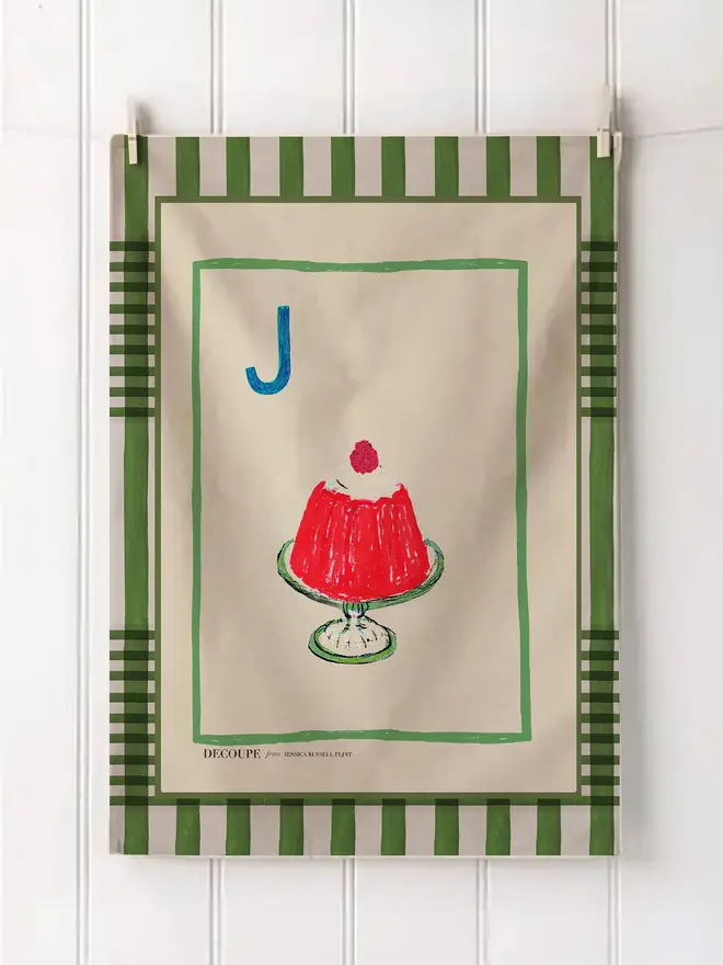 a-z alphabet tea towel. a tea towel with a jelly print and the letter 'j' in the corner.