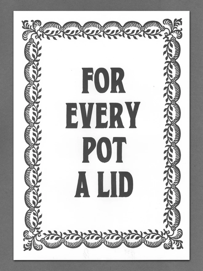 A3 letterpress print with serif block font text design "For Every Pot A Lid" bordered by vintage leaves pattern