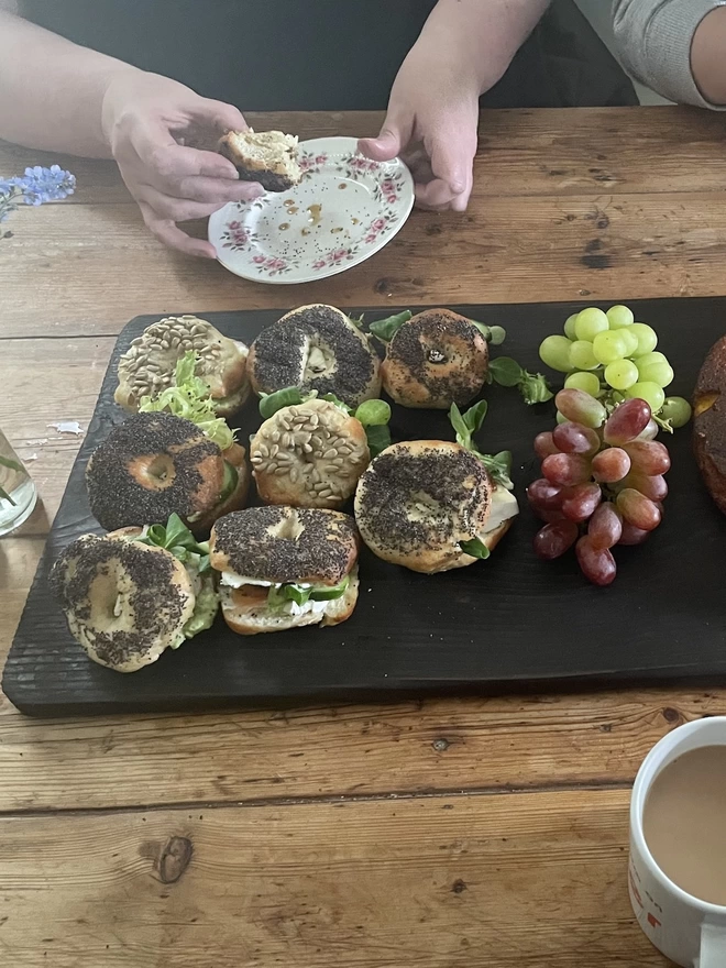 Large Charred Black Serving Board With Tasty Food