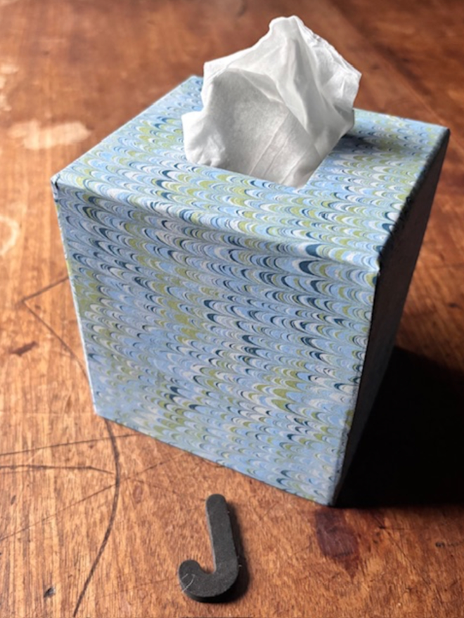 Tissue Box. A tissue box in J.