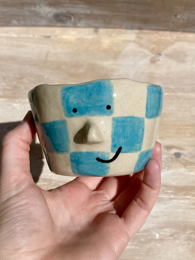 ocean checkerboard ceramic pot - held