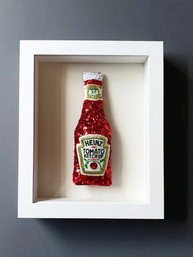 A sequinned Tomato Sauce Bottle