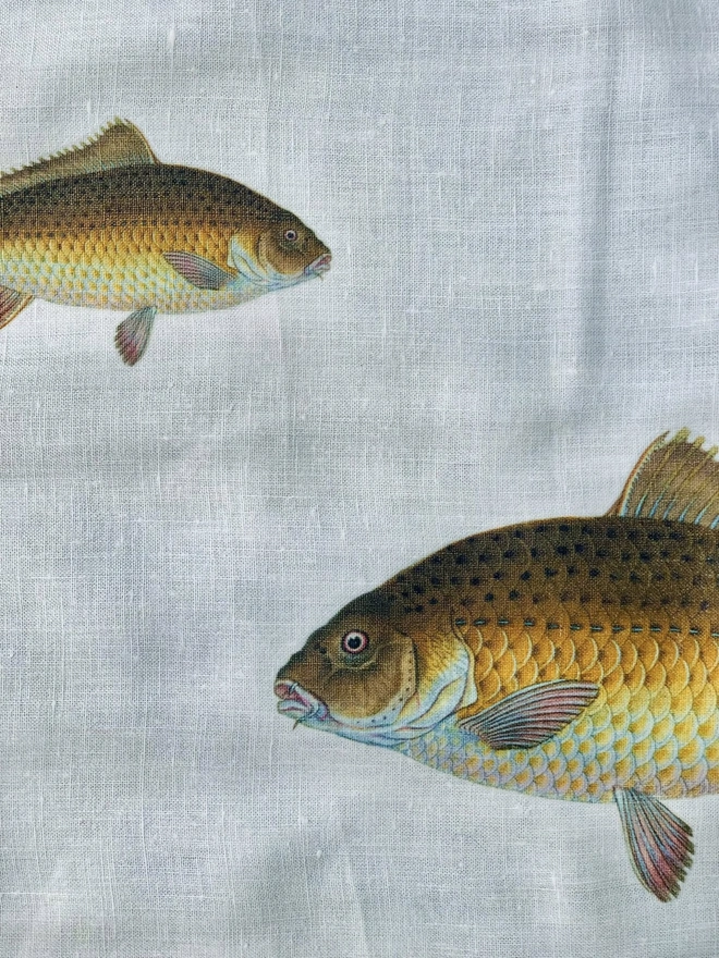 Vintage linen tablecloth printed with two fish