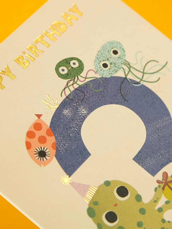 Detail image of the special gold foil details on the Raspberry Blossom children’s birthday card