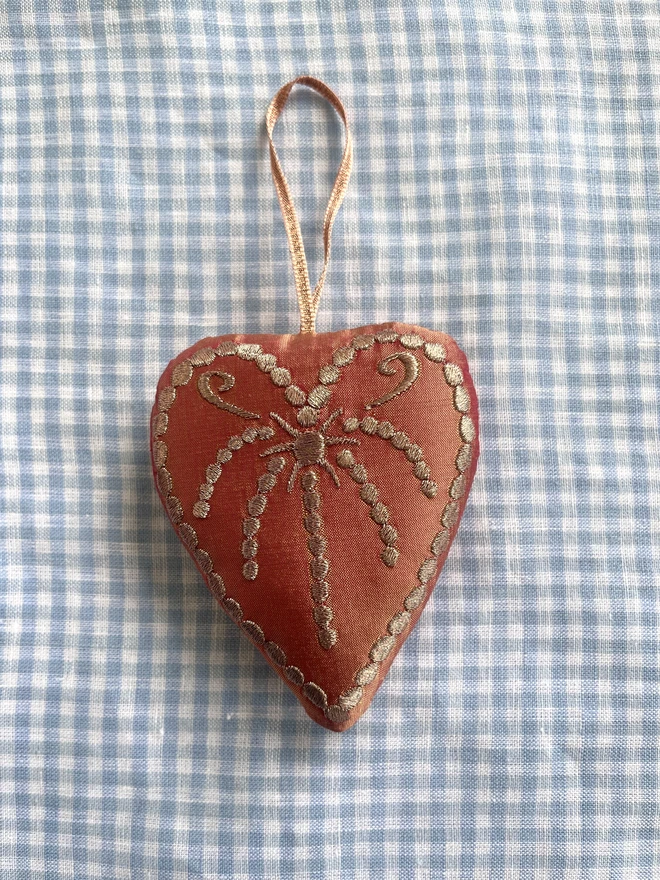 Silk heart ornament: peach silk, copper thread and ribbon