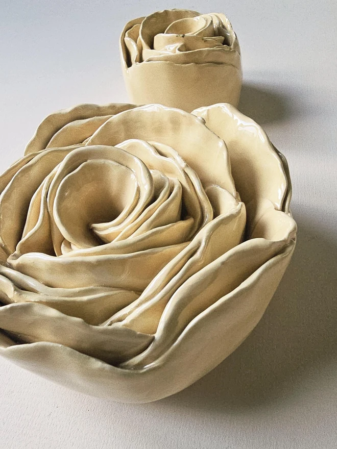 Cream handmade ceramic rose sculpture with a glossy glaze, crafted in 3D and designed to hang on a wall