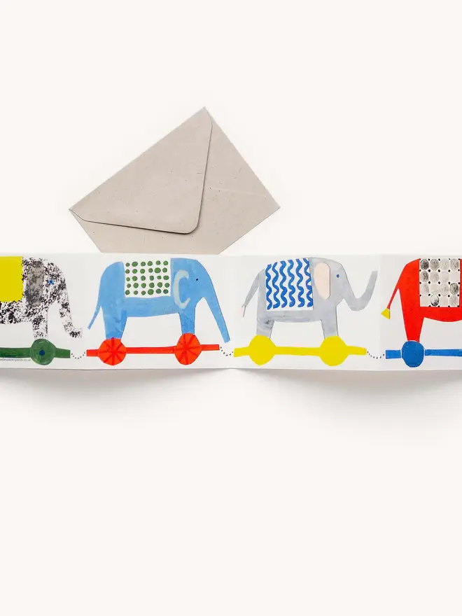 brightly coloured card with elephants